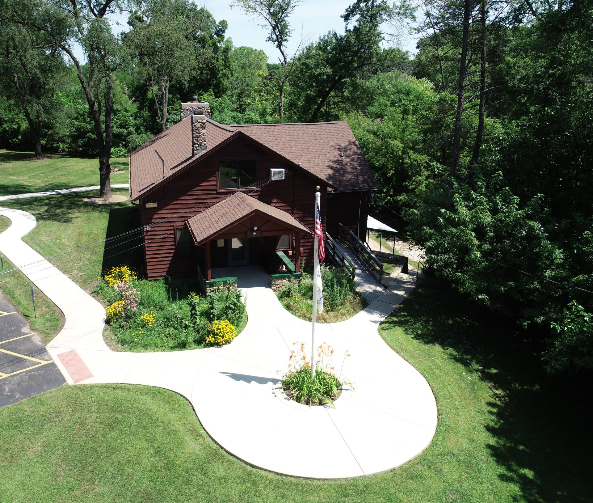 Aerial view of the front of the Izaak Walton Youth Center on a sunny day